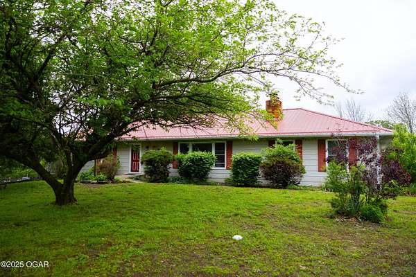 19 Acres of Land with Home for Sale in Lamar, Missouri