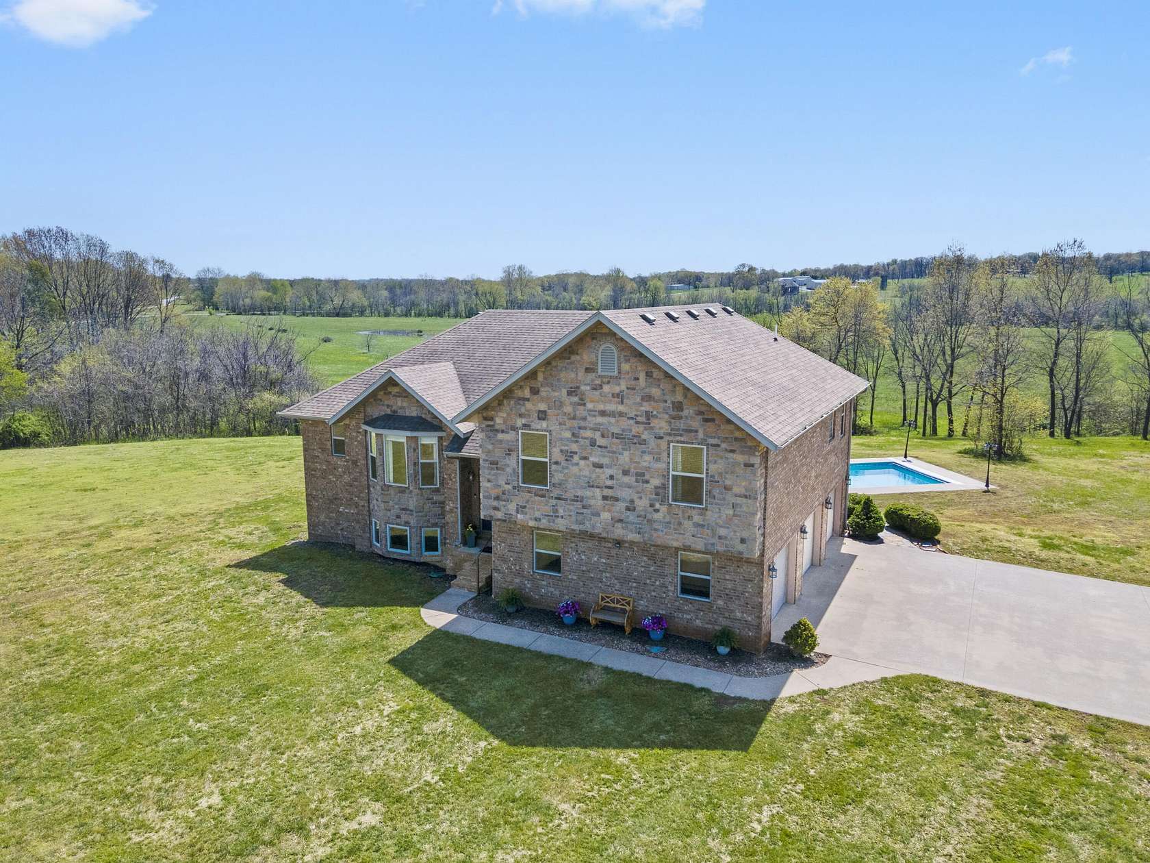 5.1 Acres of Residential Land with Home for Sale in Aurora, Missouri