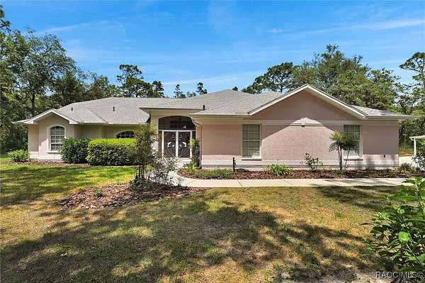 2.75 Acres of Residential Land with Home for Sale in Beverly Hills, Florida