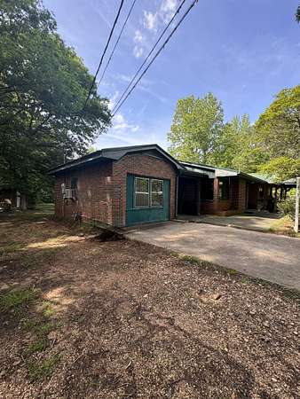 12.4 Acres of Land with Home for Sale in Russellville, Alabama