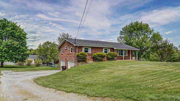 1.59 Acres of Residential Land with Home for Sale in Piney Flats, Tennessee