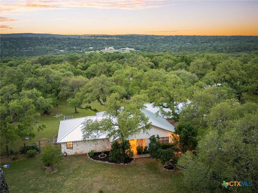 10 Acres of Residential Land with Home for Sale in Canyon Lake, Texas