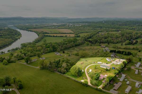 4.7 Acres of Improved Mixed-Use Land for Sale in Surgoinsville, Tennessee