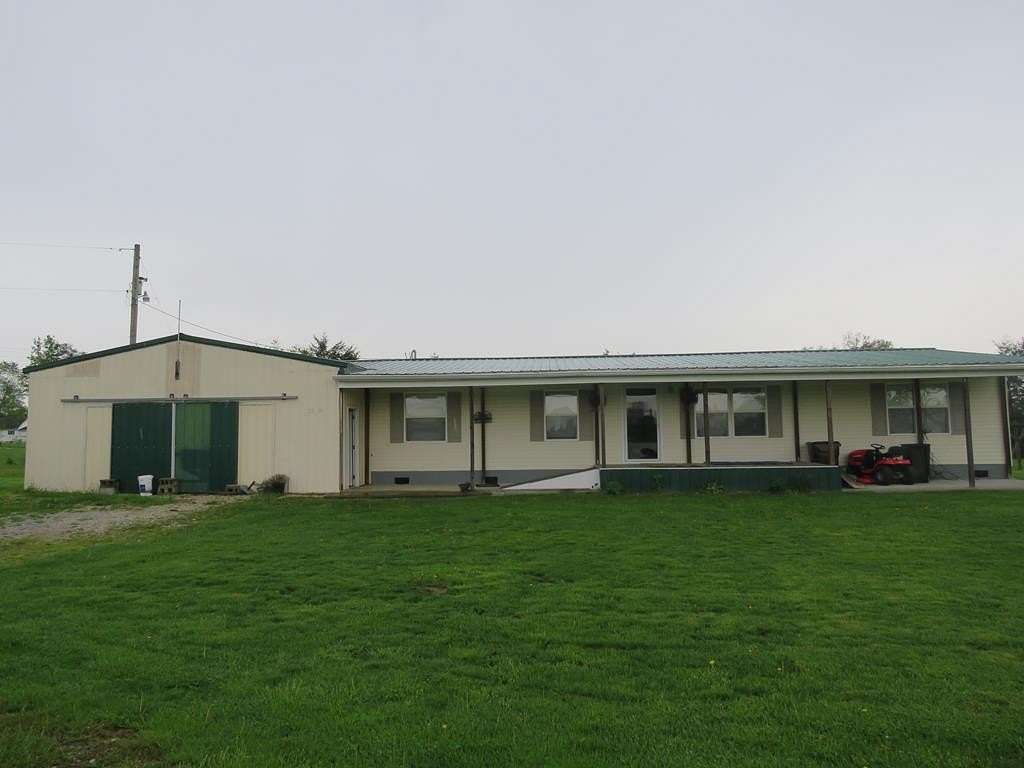 32.5 Acres of Land with Home for Sale in Tollesboro, Kentucky