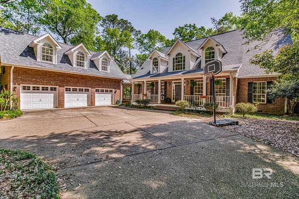 13 Acres of Land with Home for Sale in Lillian, Alabama