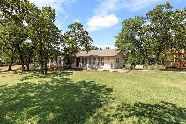 2.5 Acres of Residential Land with Home for Sale in Harrah, Oklahoma