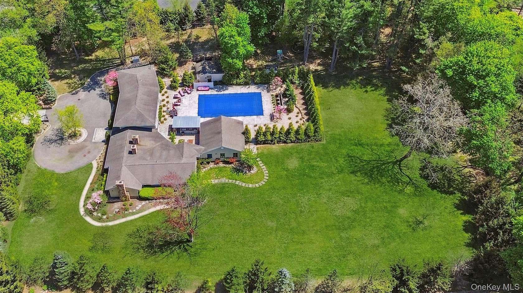 2 Acres of Residential Land with Home for Sale in Upper Brookville, New York