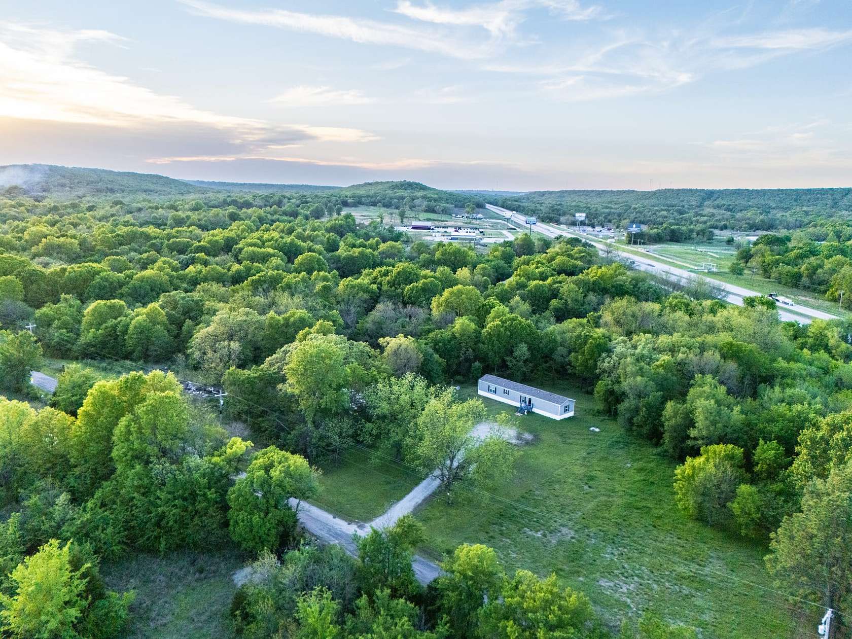 11 Acres of Recreational Land with Home for Sale in Okmulgee, Oklahoma