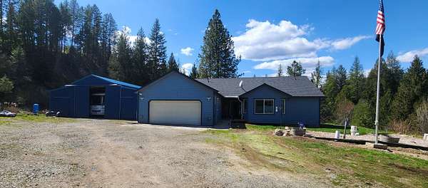 34.8 Acres of Recreational Land with Home for Sale in Kettle Falls, Washington