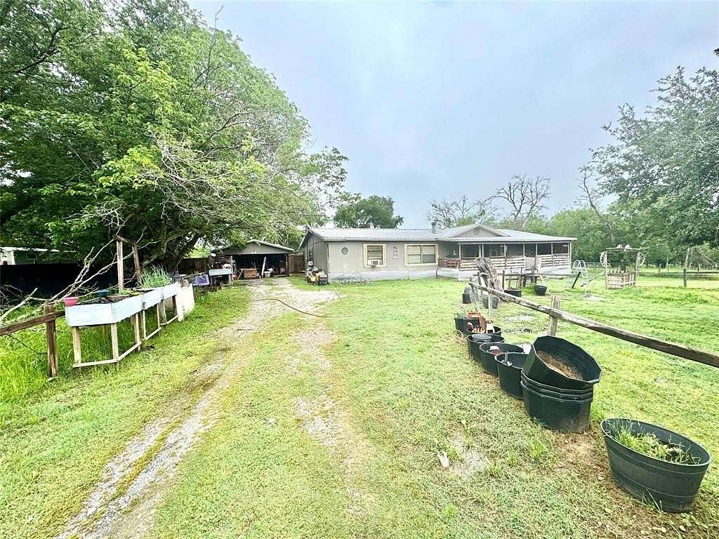 2 Acres of Residential Land with Home for Sale in Wortham, Texas