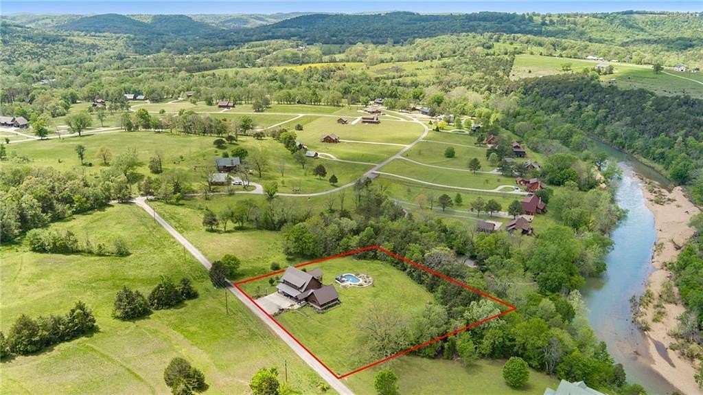 1.64 Acres of Residential Land with Home for Sale in Berryville, Arkansas