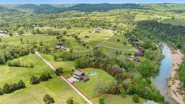 1.64 Acres of Residential Land with Home for Sale in Berryville, Arkansas