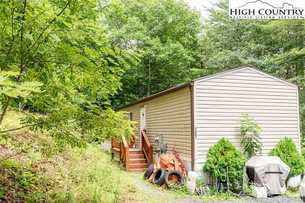 1.5 Acres of Residential Land with Home for Sale in Fleetwood, North Carolina