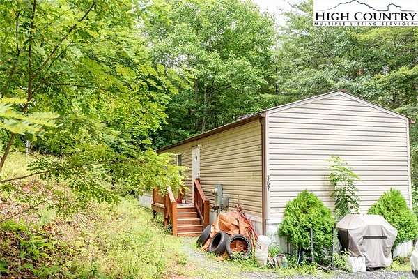 1.5 Acres of Residential Land with Home for Sale in Fleetwood, North Carolina