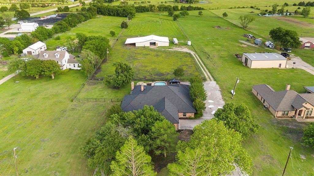 5.48 Acres of Land with Home for Sale in McLendon-Chisholm, Texas