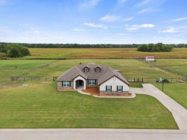 1.5 Acres of Residential Land with Home for Sale in Caddo Mills, Texas