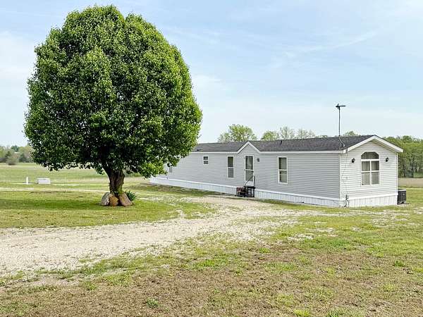 3 Acres of Residential Land with Home for Sale in Stockton, Missouri