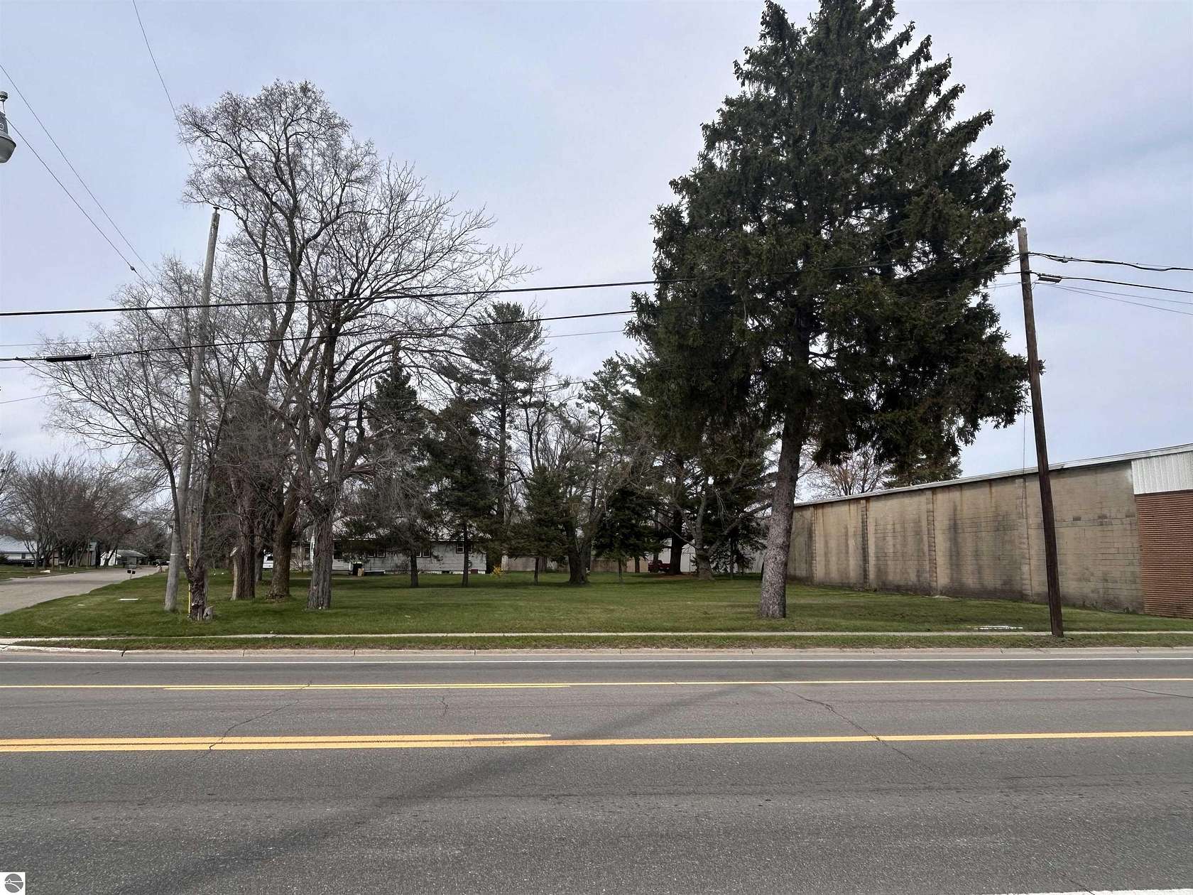 0.24 Acres of Commercial Land for Sale in Clare, Michigan