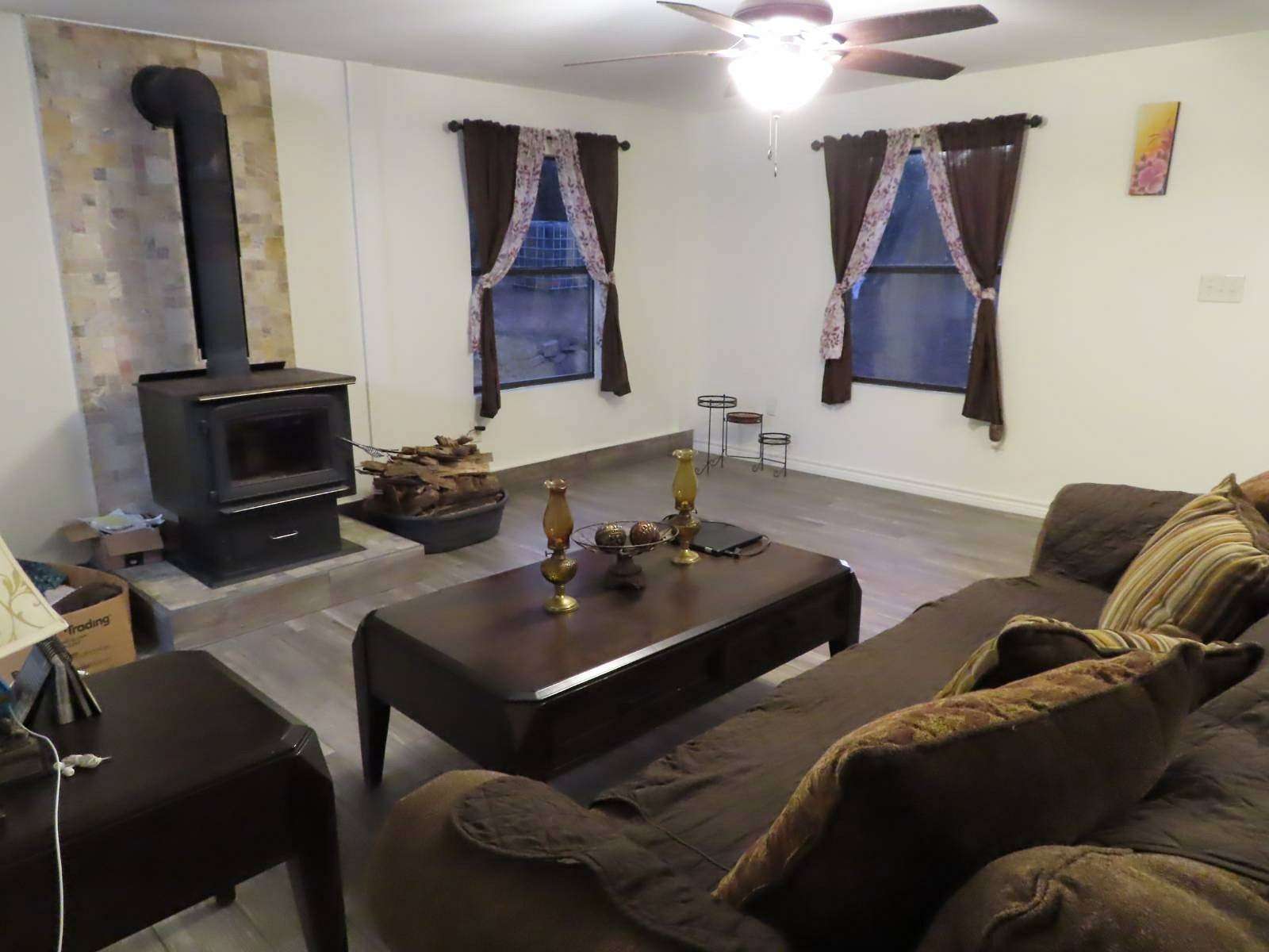 5 Acres of Residential Land with Home for Sale in Wilburton, Oklahoma