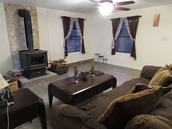 5 Acres of Residential Land with Home for Sale in Wilburton, Oklahoma