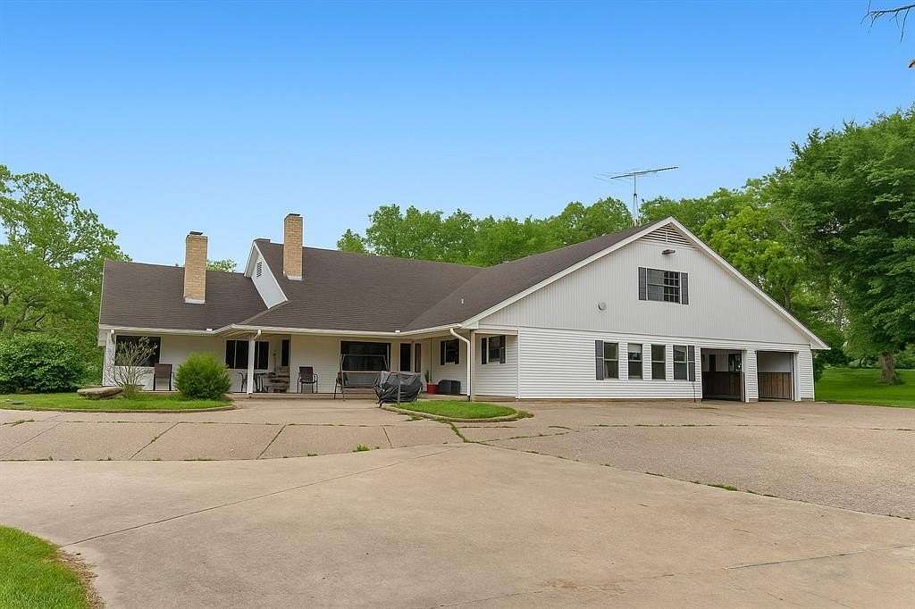 67.5 Acres of Agricultural Land with Home for Sale in Donie, Texas