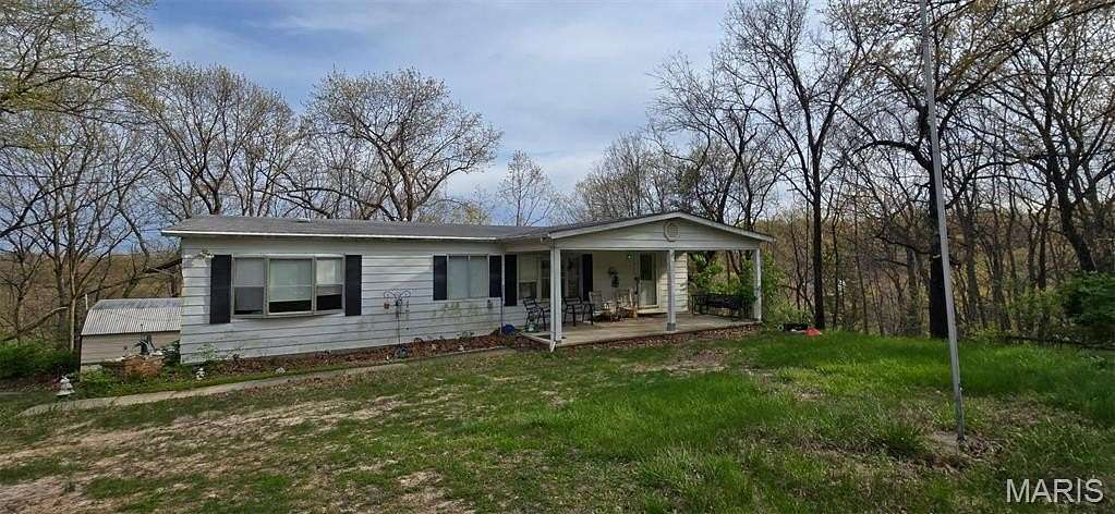 5.43 Acres of Improved Residential Land for Sale in Barnhart, Missouri
