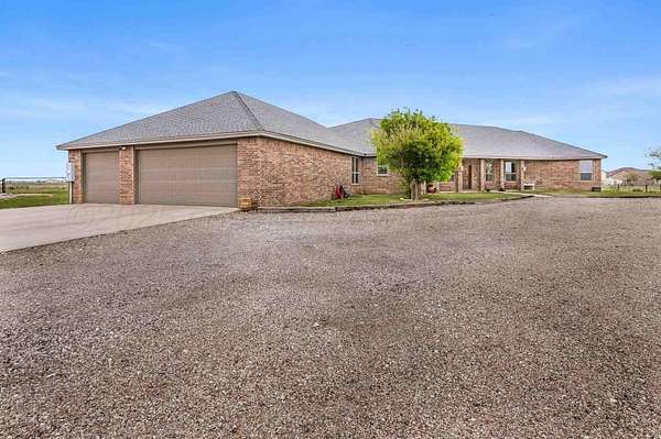 7.33 Acres of Residential Land with Home for Sale in Canyon, Texas