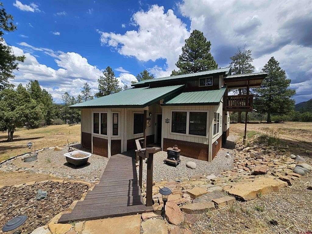 4 Acres of Residential Land with Home for Sale in Pagosa Springs, Colorado