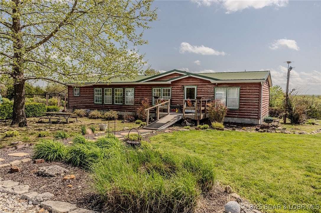 21.6 Acres of Land with Home for Sale in Urbana, Missouri