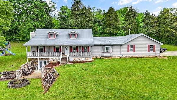 9.5 Acres of Land with Home for Sale in Dayton, Tennessee