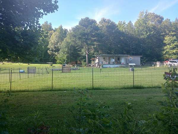 10 Acres of Recreational Land with Home for Sale in Savannah, Tennessee