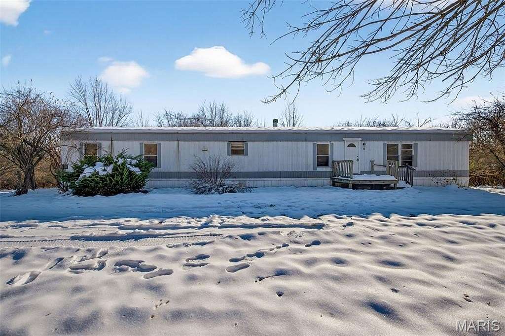 2.1 Acres of Residential Land with Home for Sale in Elsberry, Missouri