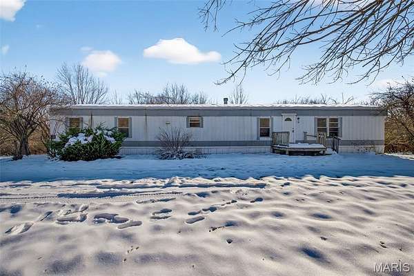 2.1 Acres of Residential Land with Home for Sale in Elsberry, Missouri