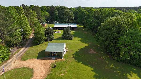 21.5 Acres of Land with Home for Sale in Coffeeville, Mississippi