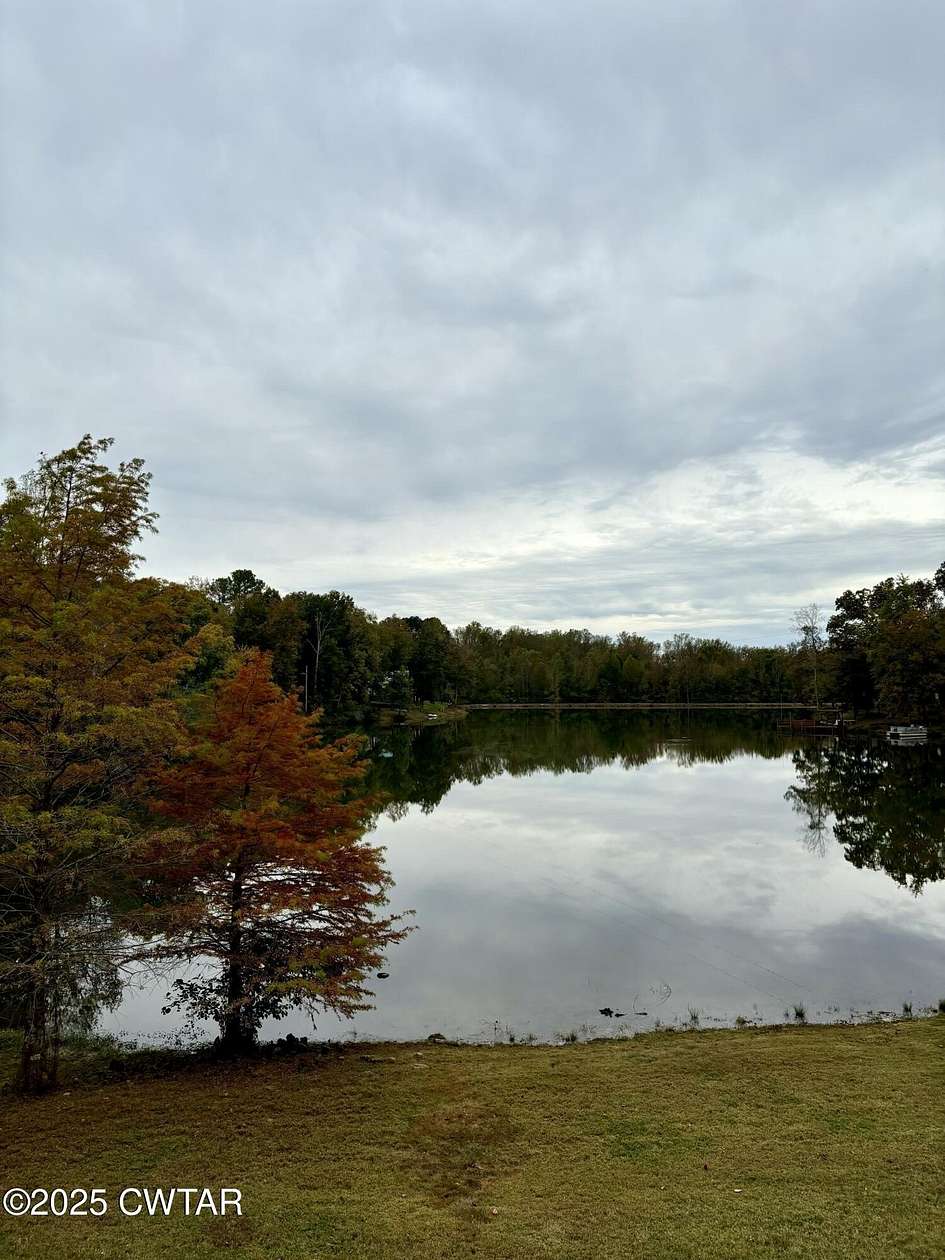 11.2 Acres of Recreational Land with Home for Sale in Cedar Grove, Tennessee