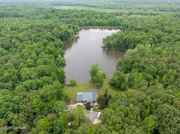 11.2 Acres of Recreational Land with Home for Sale in Cedar Grove, Tennessee