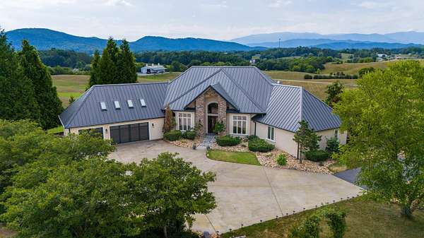 28.7 Acres of Recreational Land with Home for Sale in Sevierville, Tennessee