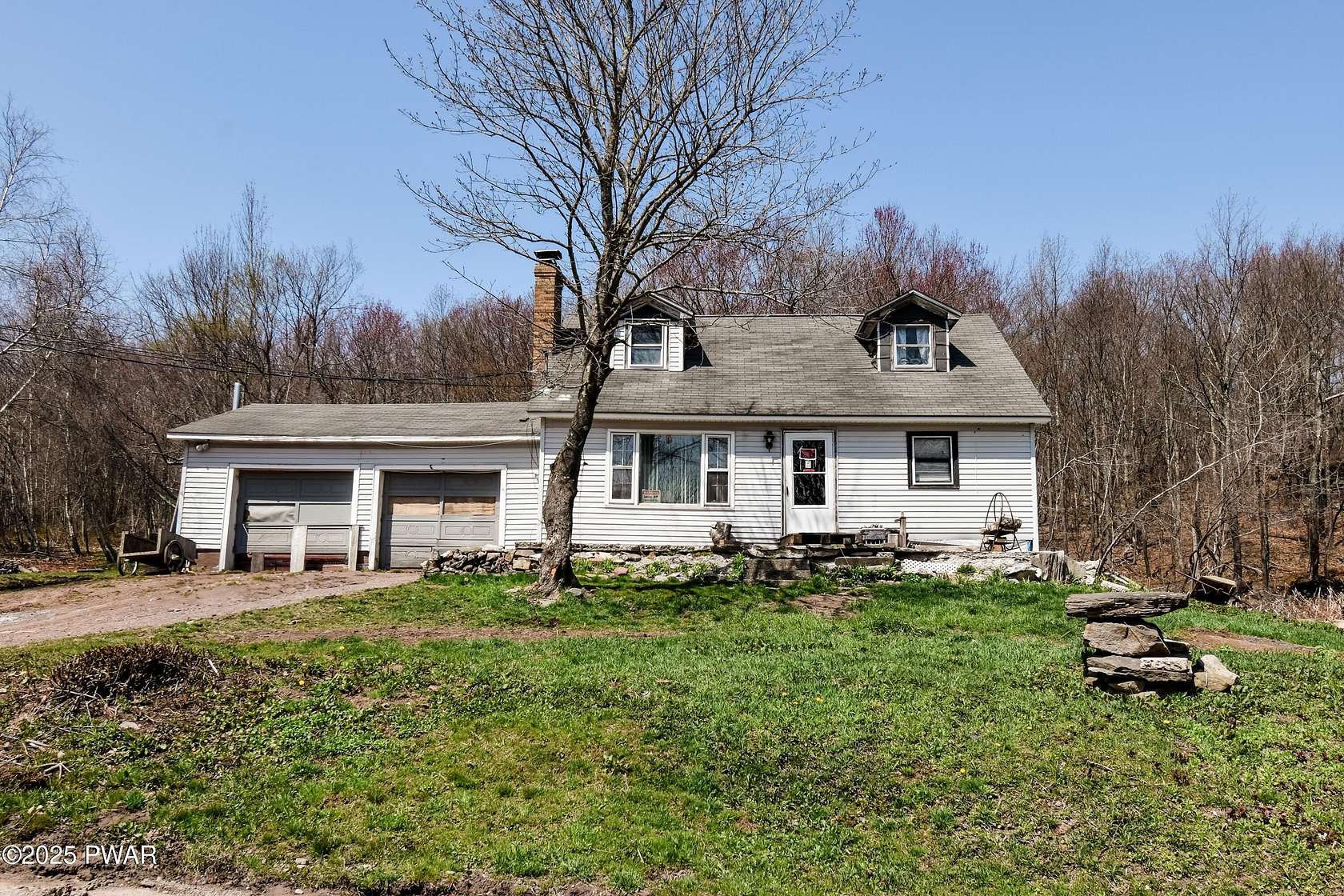 5 Acres of Residential Land with Home for Sale in Forest City, Pennsylvania