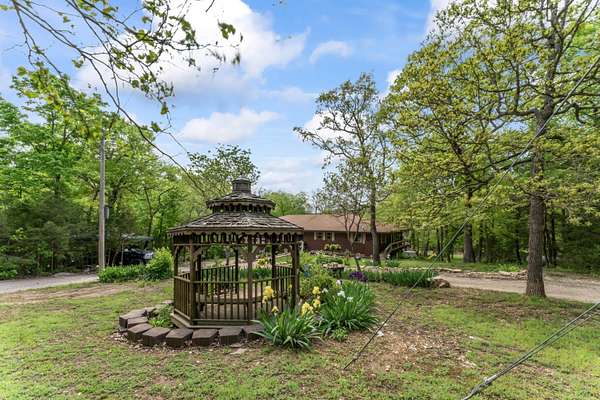 8 Acres of Residential Land with Home for Sale in Reeds Spring, Missouri