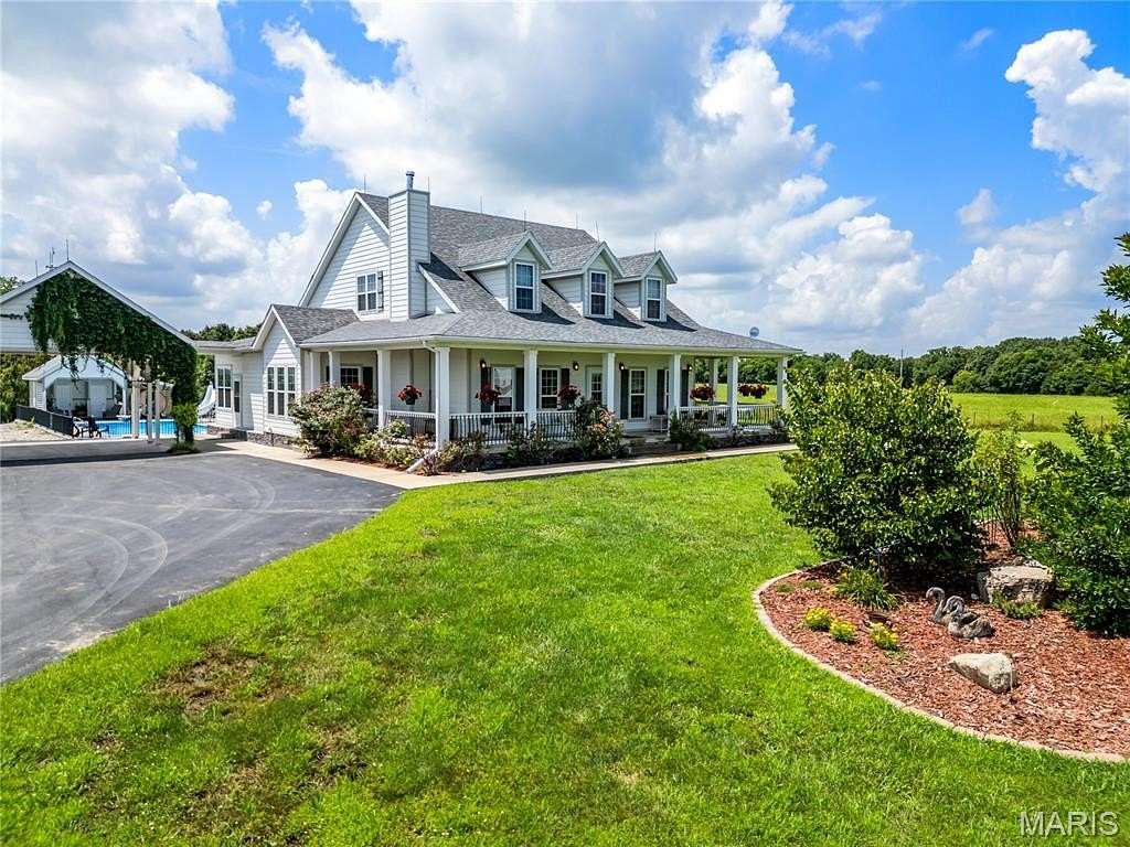 67.4 Acres of Land with Home for Sale in Crocker, Missouri