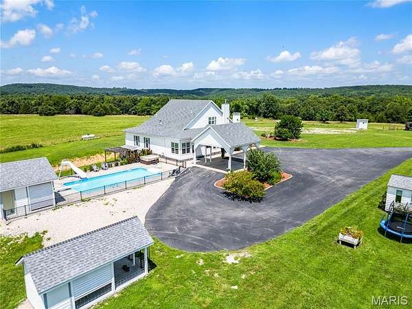 67.4 Acres of Land with Home for Sale in Crocker, Missouri