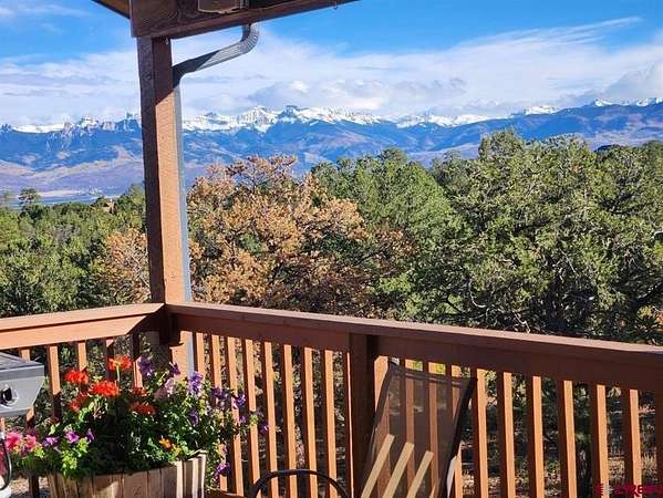 35 Acres of Agricultural Land with Home for Sale in Montrose, Colorado