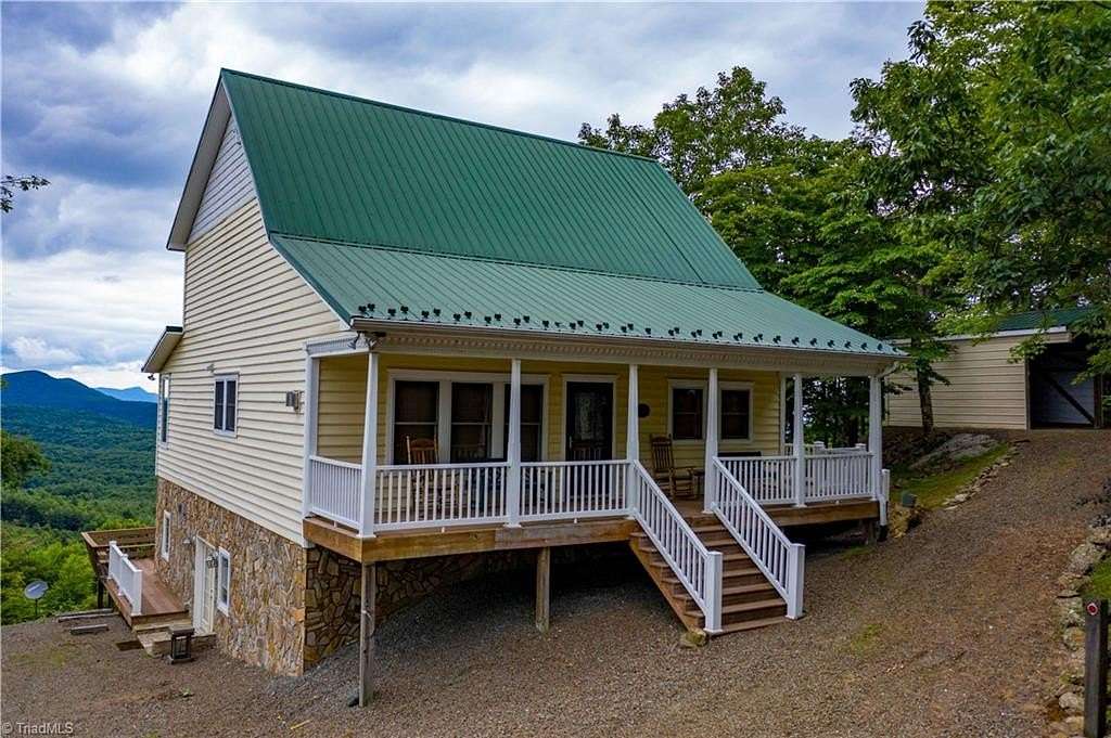 1.65 Acres of Land with Home for Sale in Glade Valley, North Carolina