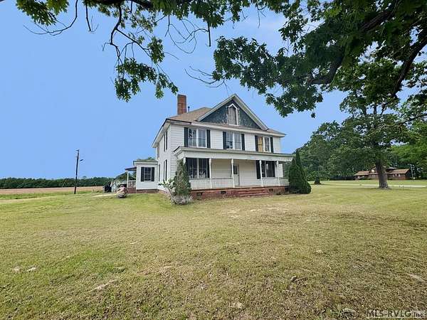 4.1 Acres of Land with Home for Auction in Enfield, North Carolina