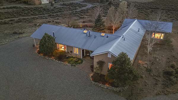 5 Acres of Residential Land with Home for Sale in Arroyo Hondo, New Mexico