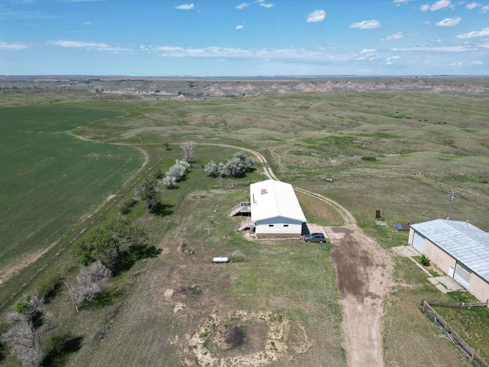 240 Acres of Agricultural Land with Home for Sale in Glendive, Montana