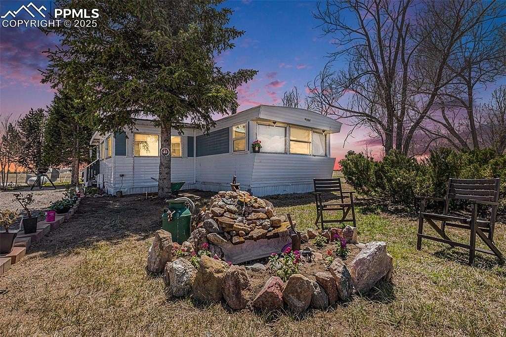 5 Acres of Residential Land with Home for Sale in Peyton, Colorado