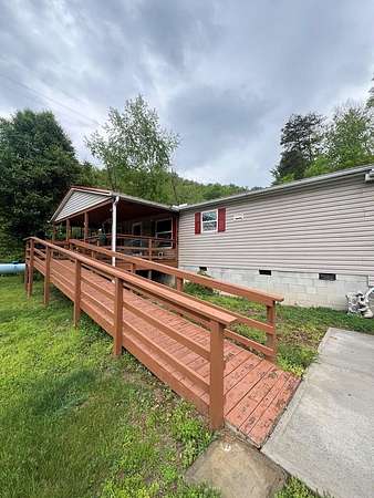 4 Acres of Residential Land with Home for Sale in Van Lear, Kentucky