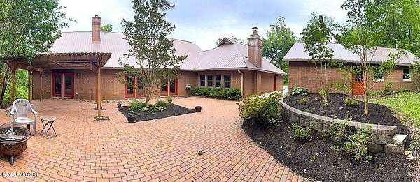 6.1 Acres of Residential Land with Home for Sale in Louisville, Tennessee
