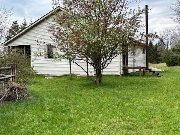 11.3 Acres of Land with Home for Sale in Seneca, Pennsylvania